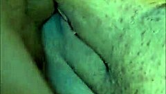 couple enjoys intimate moment in the garage