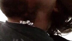 I'm performing a blowjob on a big black cock.