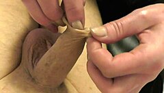 Milf Plays Foreskin In Latex Gloves