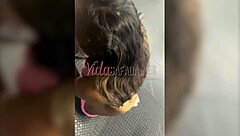 Pretty brunette gives blowjob to big cock personal trainer outdoors in public