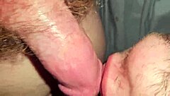 Gay guy receives deepthroat blowjob in his mouth.