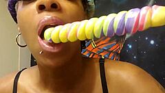 Ebony Babe Sucks Unicorn Lollipop In Fetish Detail