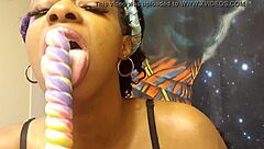 Ebony Babe Sucks Unicorn Lollipop In Fetish Detail