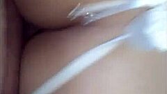 The husband passionately fucks his wife's delicious ass in the bedroom.