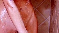 Brunette Beauty's Enchanting Shower Photoshoot on Sofa