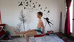 european brunette teaches yoga poses to friend