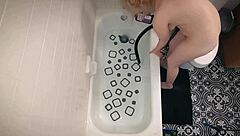 Annie Archer Showers Her Shaved Pussy Solo