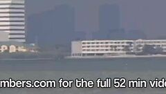 She bares her tiny titties and tight pussy at the beach