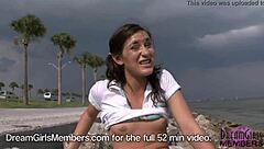 She bares her tiny titties and tight pussy at the beach