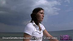 She bares her tiny titties and tight pussy at the beach