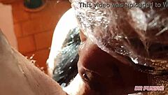deepthroat with lots of saliva dripping on the submissive african woman's body in slow motion