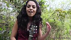 teen guitar player meets stranger outdoors