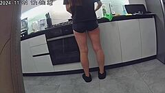 Wife cheats with husband's best friend in kitchen.