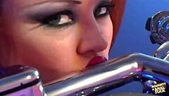 Busty redhead biker gets assfucked on her bike