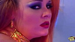 Busty redhead biker gets assfucked on her bike