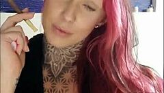 Sensual babe smokes and teases, igniting deep desires in this webcam session