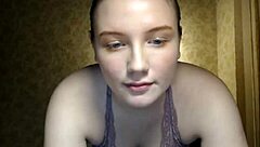 Cute shy girl shows off her big natural tits