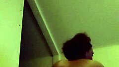 A couple engages in wet pussy riding with black cock.