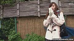 Tied Up Asian Bimbo Sucks Two Cocks And Gets Toyed