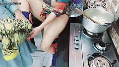 Indian wife cooking while cuckold husband drills her backdoor hard.