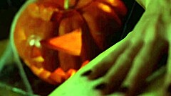 Damn, sexy devil drips hot wax on big clit and nipples!