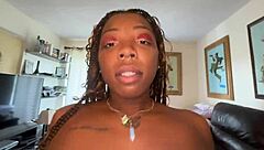 Lucy Hayz waters plants in the bedroom