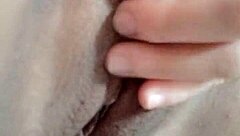 Beautiful Amateur Moans While Fingering Wet Pussy on Bed