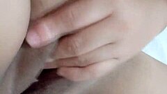 Beautiful Amateur Moans While Fingering Wet Pussy on Bed