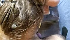 giving it to her in the shop close up