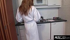 Does this sultry redhead make herself cum in the kitchen?