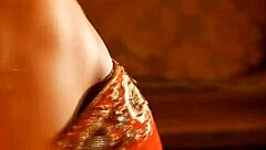 The rose of india performs a glamorous striptease, getting naked with clothes ripped by her lover.