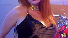 busty redheaded biker girl rides her precious bike with thick booty