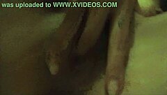 She's playing with her pussy through fingering and masturbation.