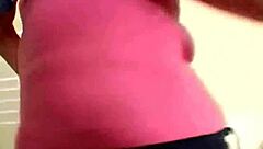 A beautiful blonde teenage girl is jerking off a hard cock in this POV video
