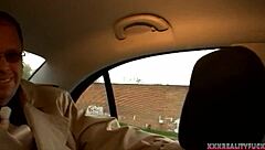 Horny milf driving taxi gives blowjob to stranger in outdoor car