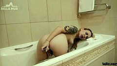 girl with bubble butt and small tits takes care of her wet pussy with dildo in the shower, reaching orgasm