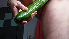 german granny fucks hairy pussy with cucumber