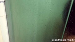 Big black guy bathes and gets blowjob from white guy.