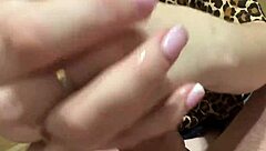 oil massage on penis makes it swell during masturbation, with feet and blue eyes in lingerie.