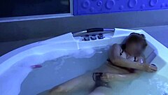 beautiful stepmother in the motel jacuzzi plays with toys before sex