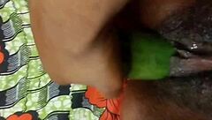 Cyndy feels intense pleasure from cucumber fuck leading to squirt