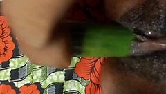 Cyndy feels intense pleasure from cucumber fuck leading to squirt