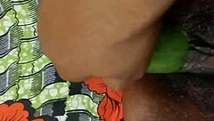 Cyndy feels intense pleasure from cucumber fuck leading to squirt