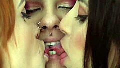 Bizarre tongue triple kissing with clothes ripped and wet goth lesbians