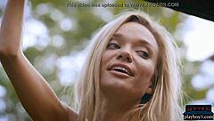 Amazing ass Russian blonde Zhenya Belaya strips outdoors in the woods.