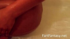 Amber Star creates stinky fart bubbles in the bath for ass worship.