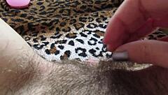 Hairy girl masturbates with vibrator