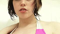 Girl in the shower caresses herself and gets excited during casting.