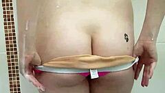 Girl in the shower caresses herself and gets excited during casting.