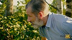 Old4k girl stuns old man with a blowjob and gets pounded outdoors by the lake.